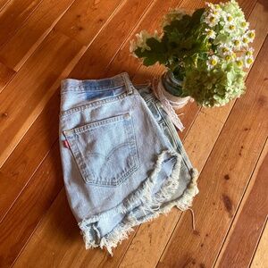 Distressed light blue denim Levi cutoff shorts